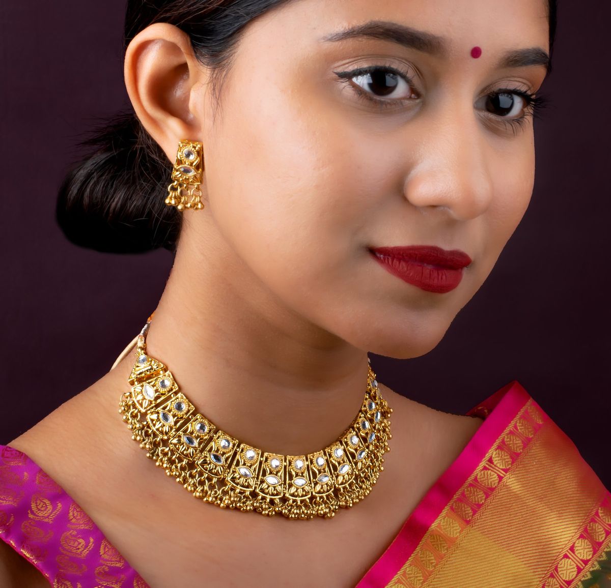 Kundan necklace set photographed on a model in studio