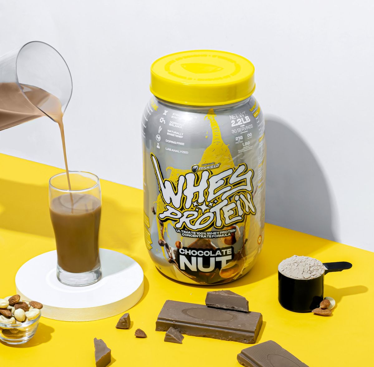 Whey protein chocolate nut product photography by Team TSB